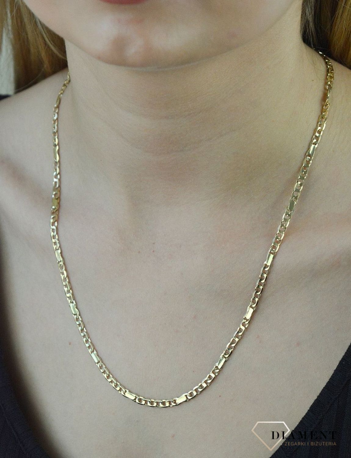 Złoty łańcuszek 585 pancerka z blaszkami 4mm LA 3478 4mm. Klasyczny i uniwersalny łańcuszek o splocie pancerki z blaszakami, wykonany z żółtego złota próby 585 o wadze około 14,66 g. Łańcuszki to uniwersal (1).png